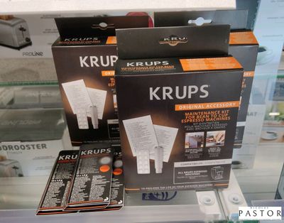 deux boîtes de Krups exposées dans un magasin