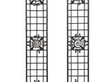 pair of wrought iron wall hangings with sun design