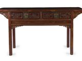 an old wooden table with a drawer on top of it