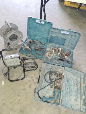 a lot of tools that are sitting on the floor