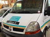 a white van that is parked in a garage