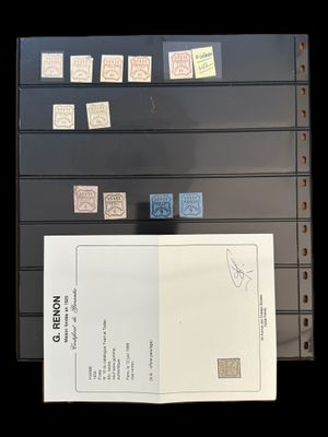 a stack of stamps and a postcard sitting on top of a filing cabinet