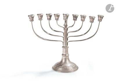 an image of a silver menorat with five candles on it