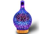 a purple and blue glass vase with a starburst pattern on it