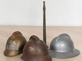 three helmets sitting next to each other on a table