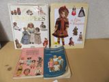 three books that are sitting on a table