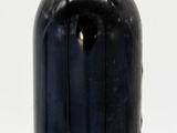 a bottle of wine that is sitting on a table