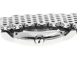 a close up of a tennis racket on a white surface