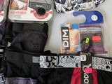 several pairs of men ' s underwear are laid out on a table
