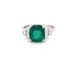 an emerald and diamond ring