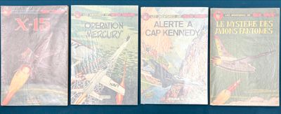 quatre livres sont alignés sur une surface bleue
