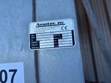 a sign that says amotec mv on the side of a building