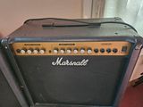 a close up of a guitar amp sitting on the floor