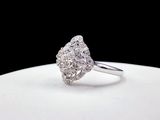 an image of a diamond ring on a white plate
