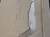 a picture of a picture of a crack in a piece of paper