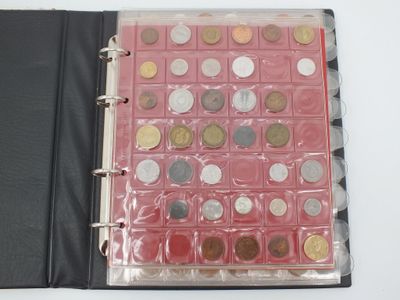 a binder with a lot of coins inside of it