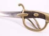 a close up of a knife on a white surface