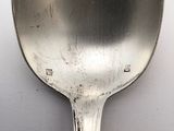 a spoon that is sitting on a table