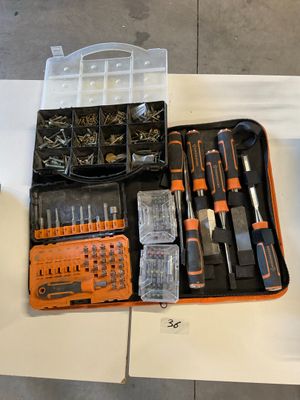 many different tools in the case on the table