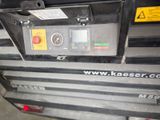 a close up of a machine that is on the ground
