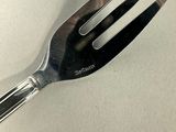 a fork and a spoon sitting on a table