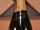 a bottle of champagne that is sitting on a table