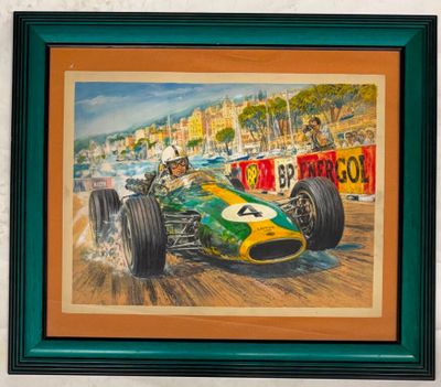 tableau représentant une voiture de course, encadré de vert, accroché au mur