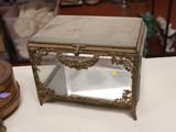 a glass box that is sitting on a table