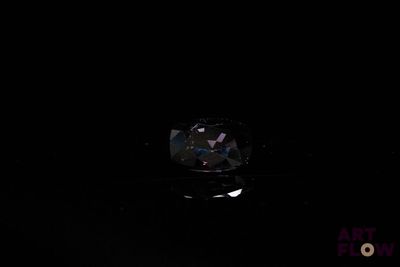 an image of a black diamond in the dark