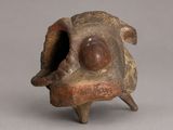 an image of a sculpture of a fish with its mouth open