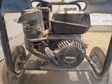 a small engine that is sitting on a cart