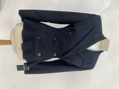 a black jacket and pants on a mannequin mannequin
