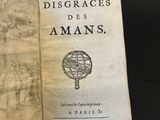 an open book with a drawing of a globe on it