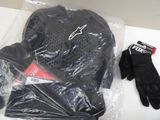 a pair of gloves, gloves and a glove on a table