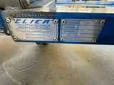 an image of a blue trailer with a sign on it
