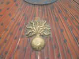 a close up of a metal object on a wooden floor