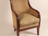 an image of a chair with a striped upholstered seat