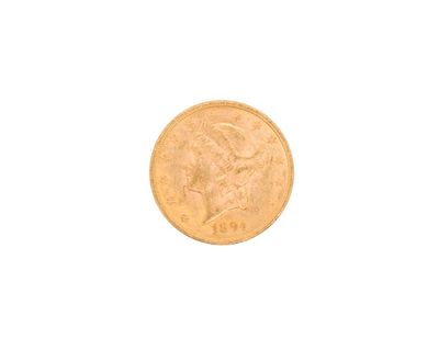 a close up of a gold coin on a white background