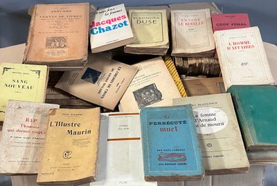 a lot of old books on a white table