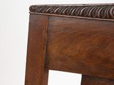 a wooden chair with a wooden seat and a wooden back