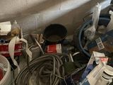 a lot of clutter on the floor in the room