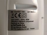 a close up of a white refrigerator with a label on it