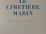 the front cover of a book with blue writing on it