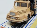 a toy truck that is sitting on top of a box