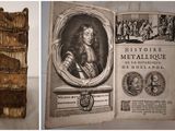 an old book with a picture of a man on it and a picture of a woman in a dress