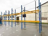 an image of a warehouse racking system on a rainy day