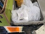 a fire hydrant that is sitting inside of a box