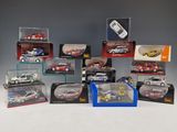 many different models of cars in a display case