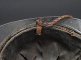 a close up of a helmet on a table
