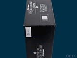 a black box with a red and white label on it